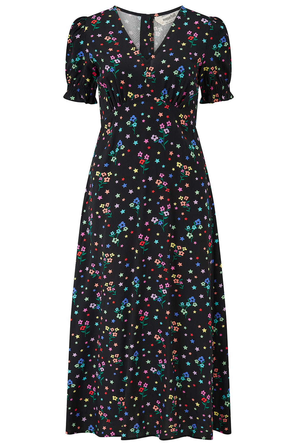 A mid-length black dress with a V-neck and short-shirred sleeves, adorned with a multicolor floral and star print.