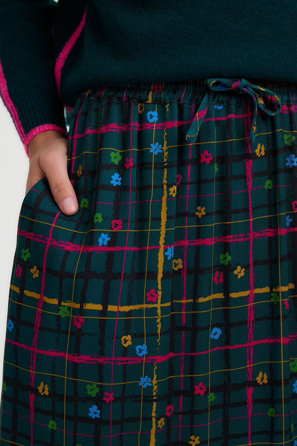 Plaid skirt with colorful patterns on a plain background