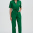 Woman wearing a green jumpsuit on a white background