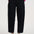 Person wearing black pants and a pink top on a white background