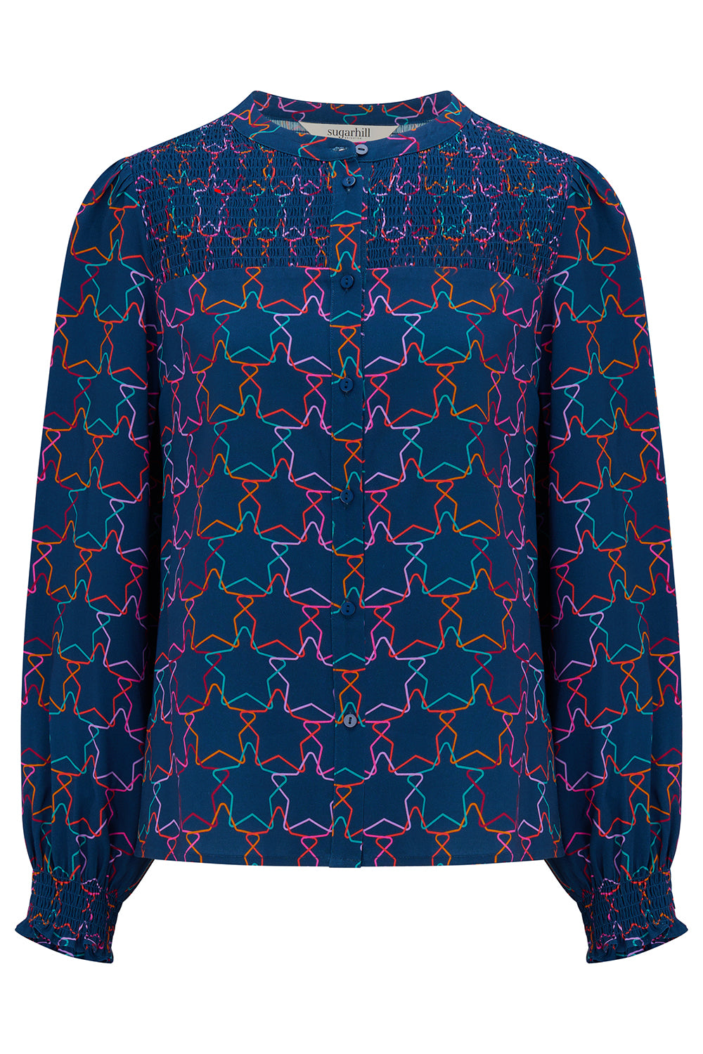 Blue blouse with colorful star pattern on a white background