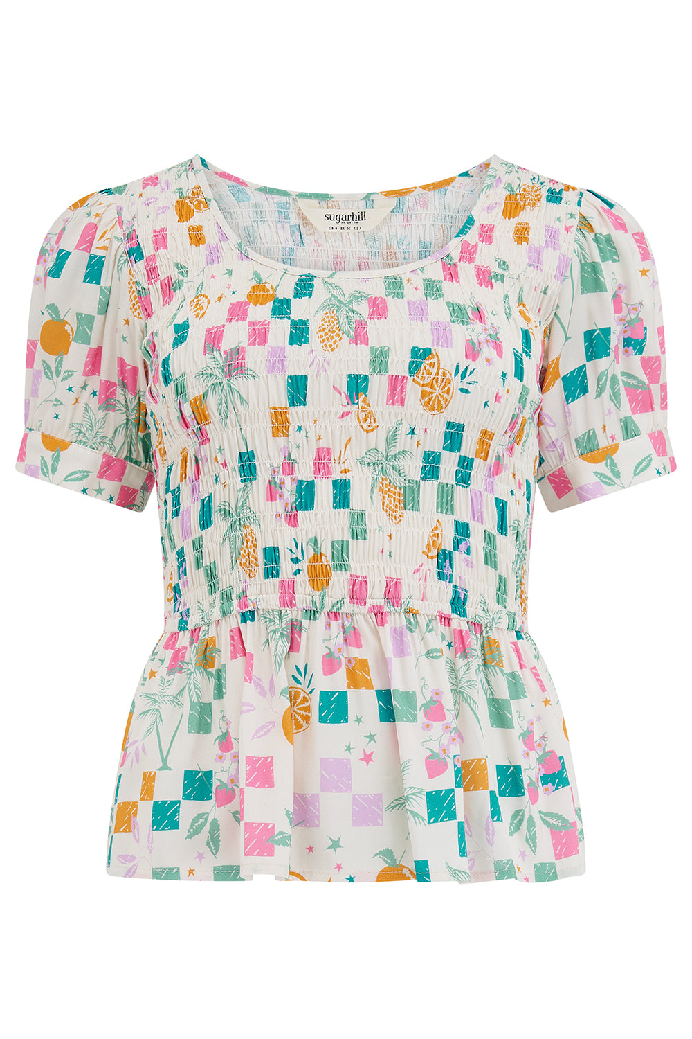 Colorful patterned blouse on a white background