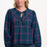 Sugarhill Brighton model wearing a blue and pink plaid shirt on a white background