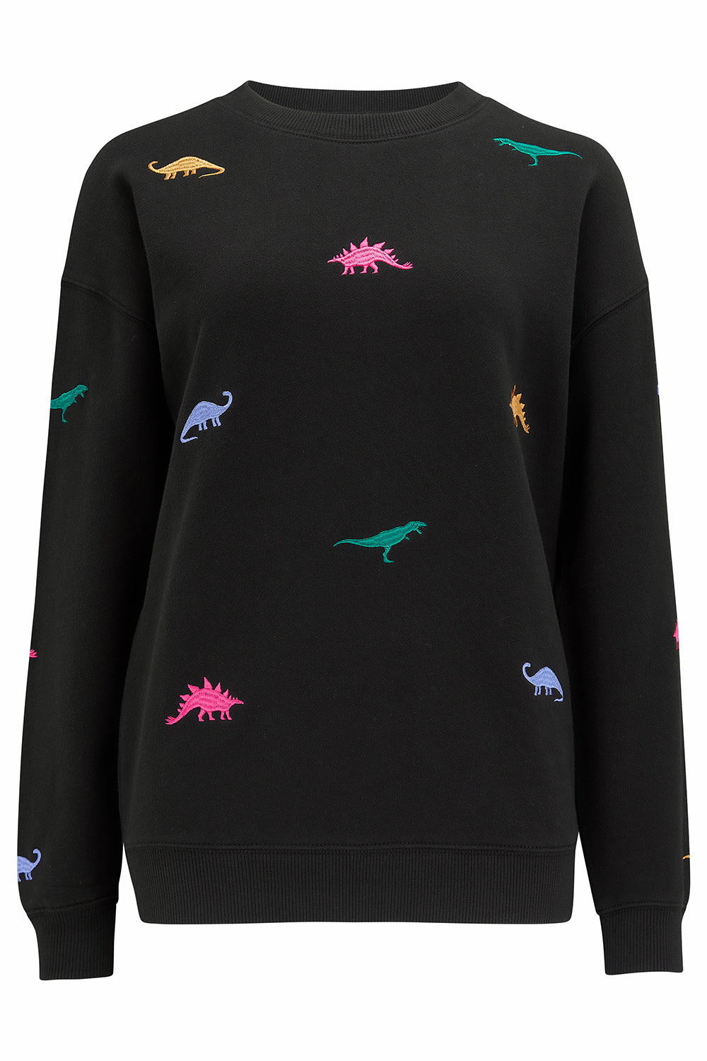 A woman wearing a black sweatshirt with multicoloured embroidered dinosaurs