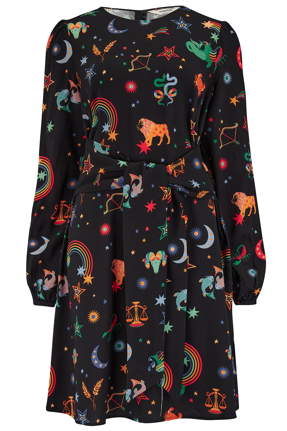 A woman standing and wearing a black mini dress with a Zodiac Rainbow Skies print featuring multicolored celestial icons on a black base.