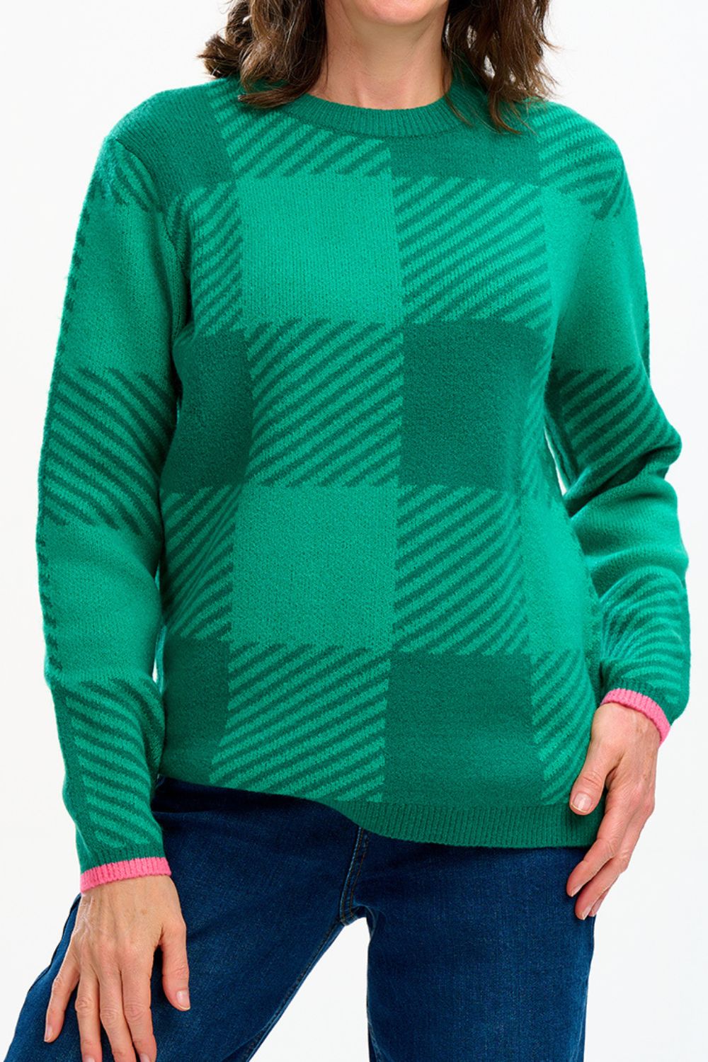 Green checkered sweater worn by a person on a white background