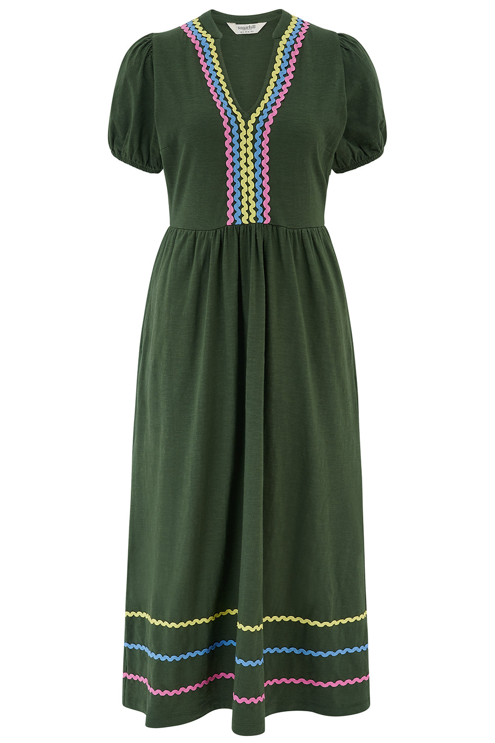 Green dress with colorful embroidery on a white background