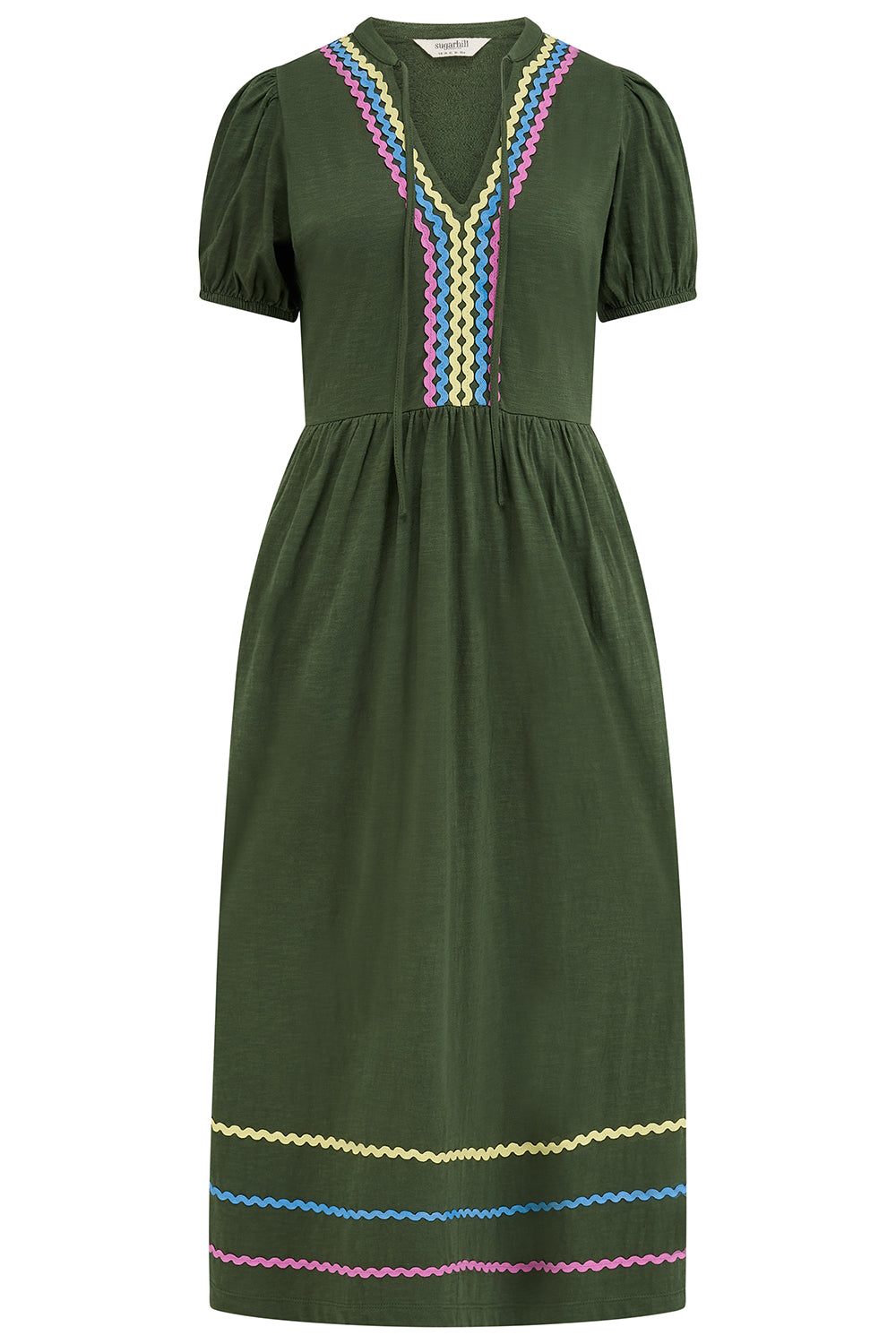 Green dress with colorful embroidery on a white background