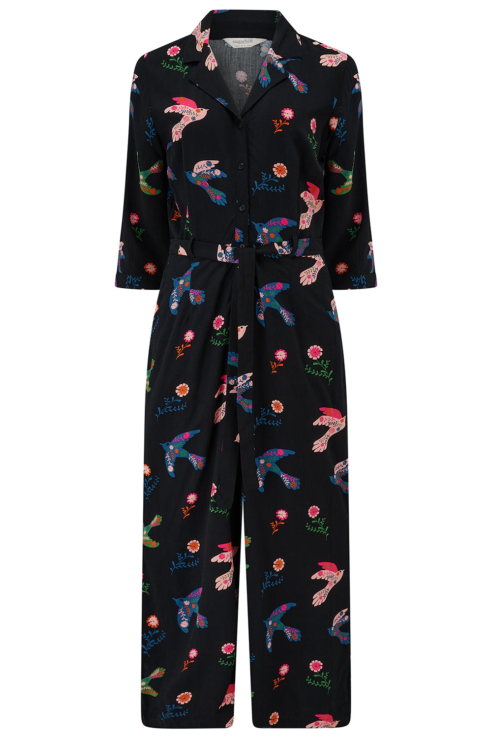Black jumpsuit with colorful abstract patterns on a white background