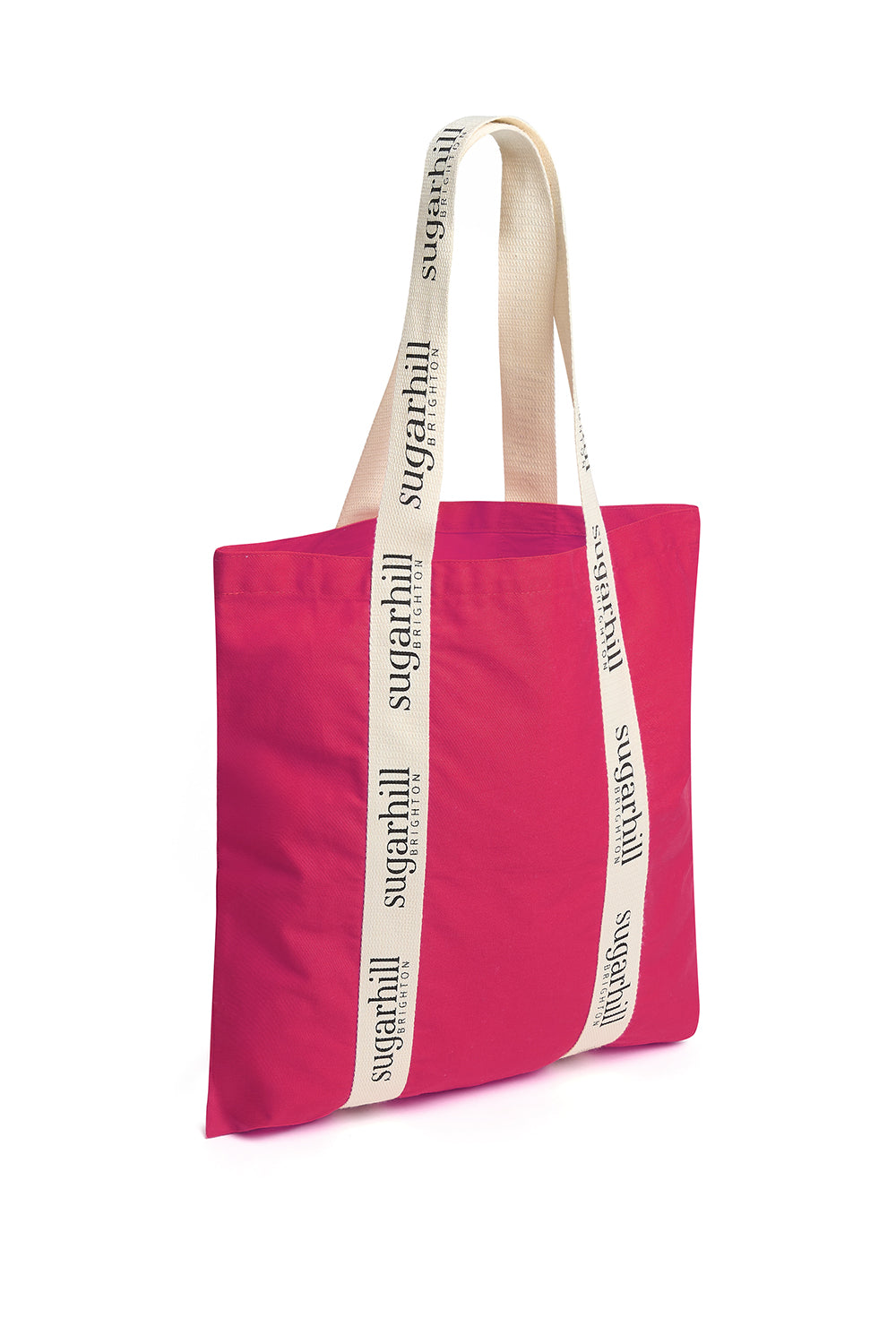 Pink tote bag with a white strap featuring text on a white background