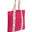 Pink tote bag with a white strap featuring text on a white background