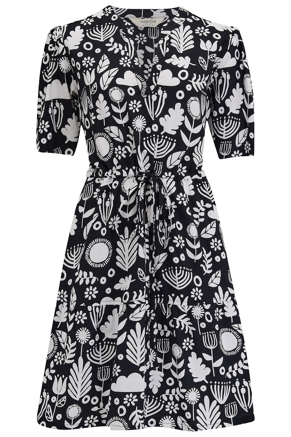 A black mini shirt dress with a monochrome folk floral pattern.