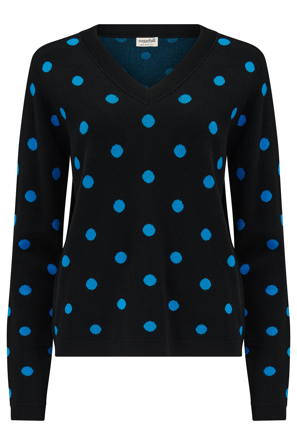 Black sweater with blue polka dots on a white background