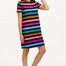 A model wearing a black and multicolored striped t-shirt dress with short sleeves.
