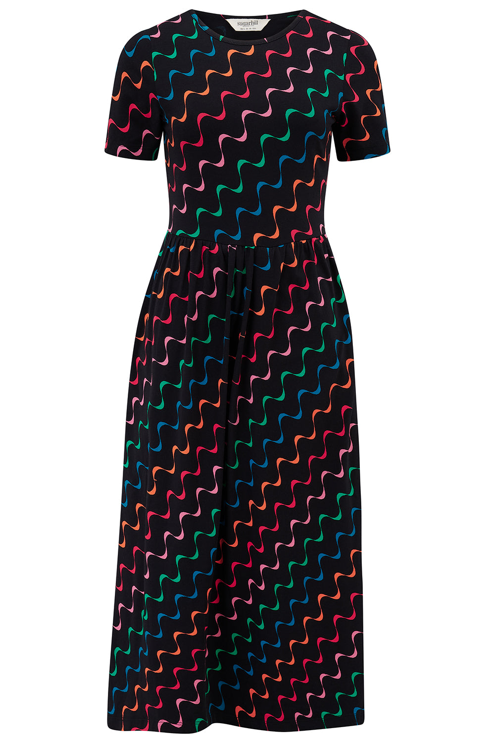 A midi-length jersey cotton dress with a round neckline, elasticated waistband, short sleeves, and a pattern of undulating waves in black, red, and green.