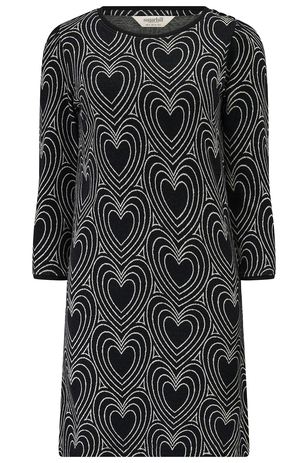 Black dress with heart pattern on a plain background