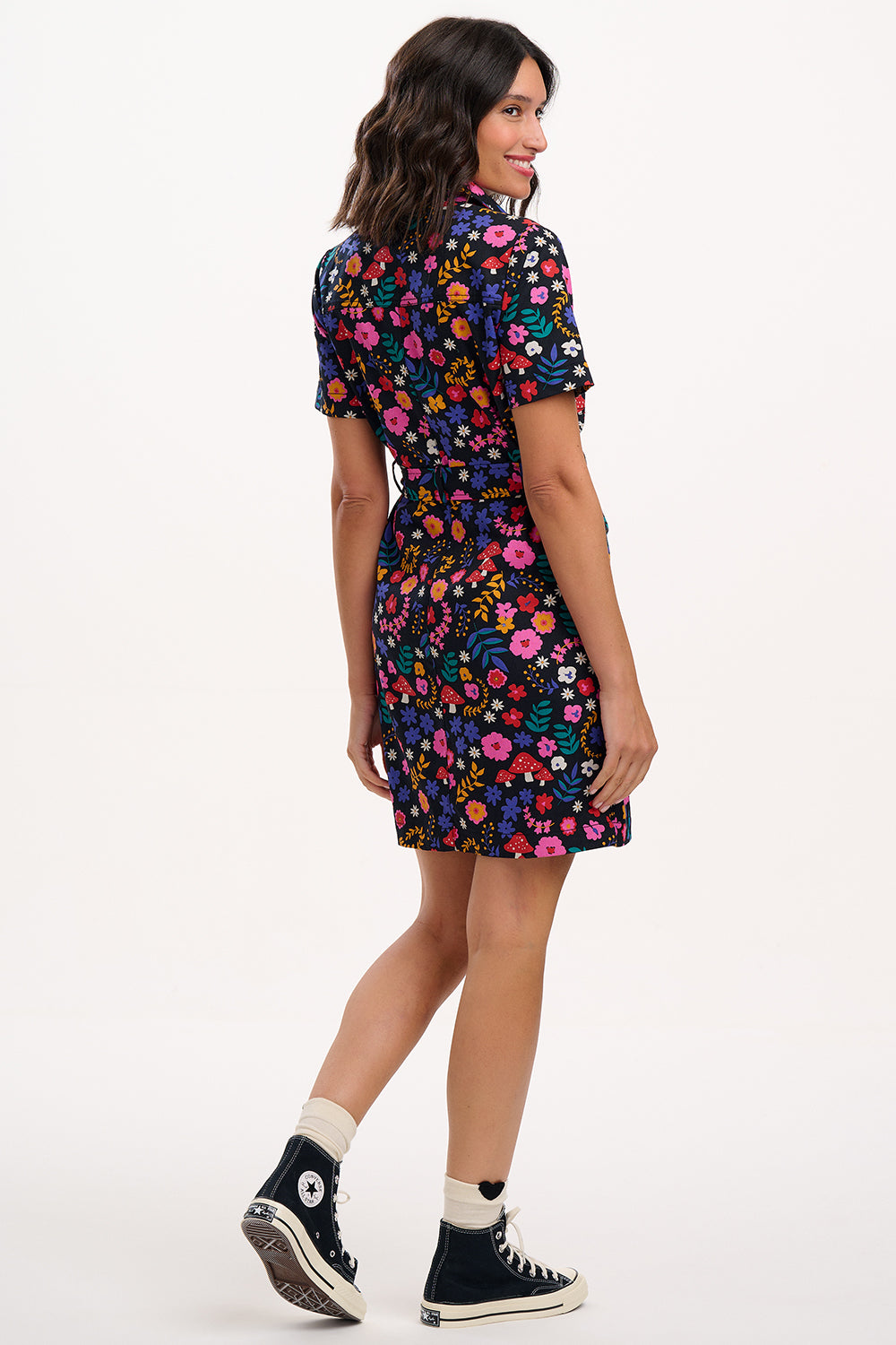 Woman wearing a colourful floral dress