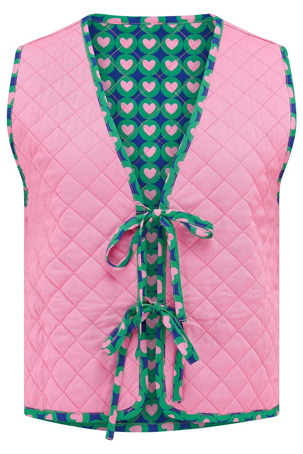 Pink quilted vest with green heart pattern on a white background