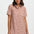Woman wearing a pink leopard print dress on a white background