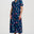 Navy blue dress with colorful floral and parrot pattern on a white background