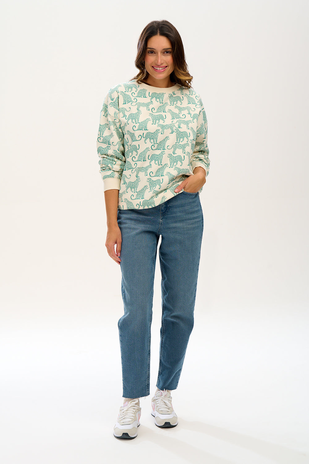 woman modelling sweatshirt with leopards on 