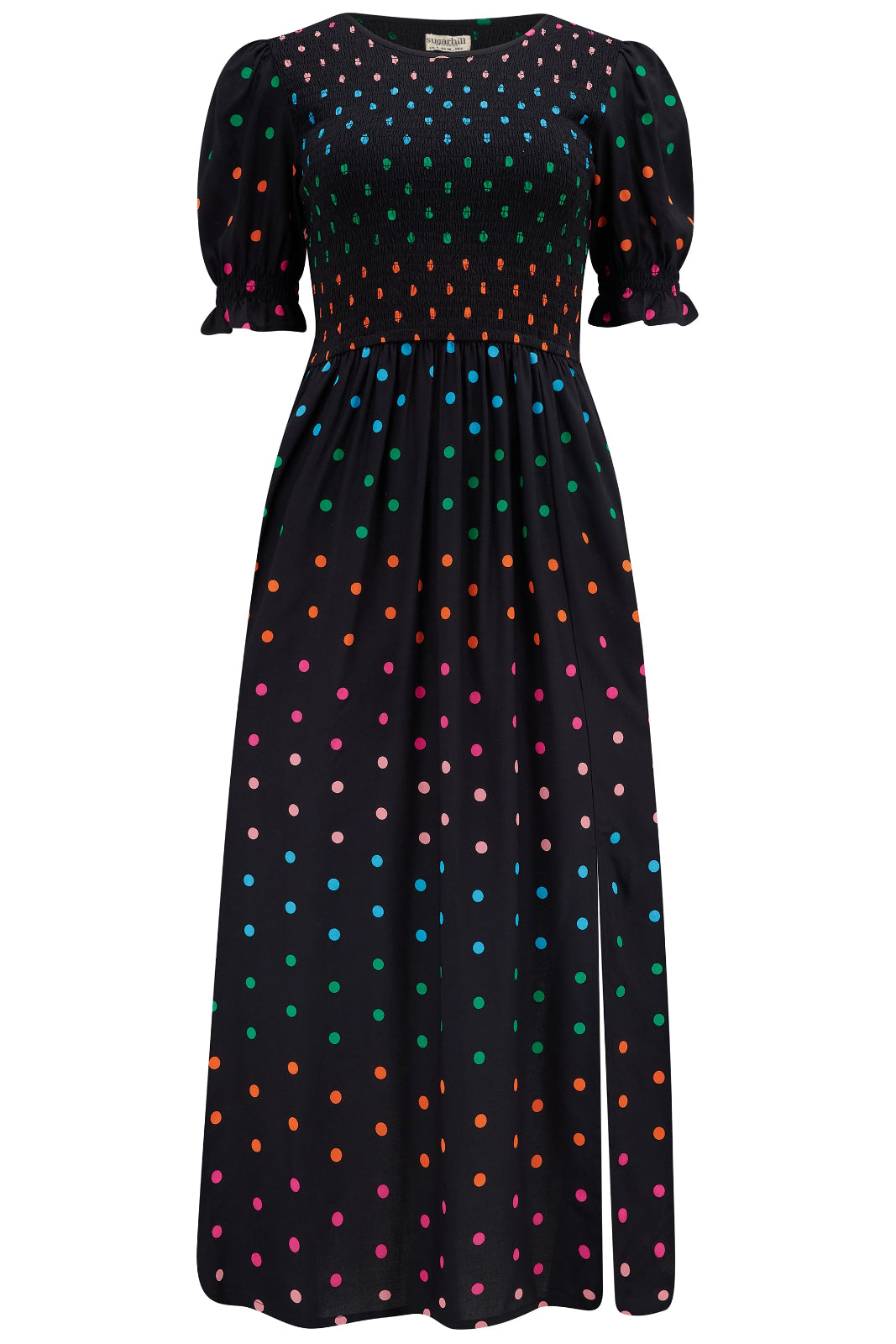 A midi shirred dress with a black and rainbow polka print. The dress features a shirred bodice, elasticated puff sleeves, and a split hem.